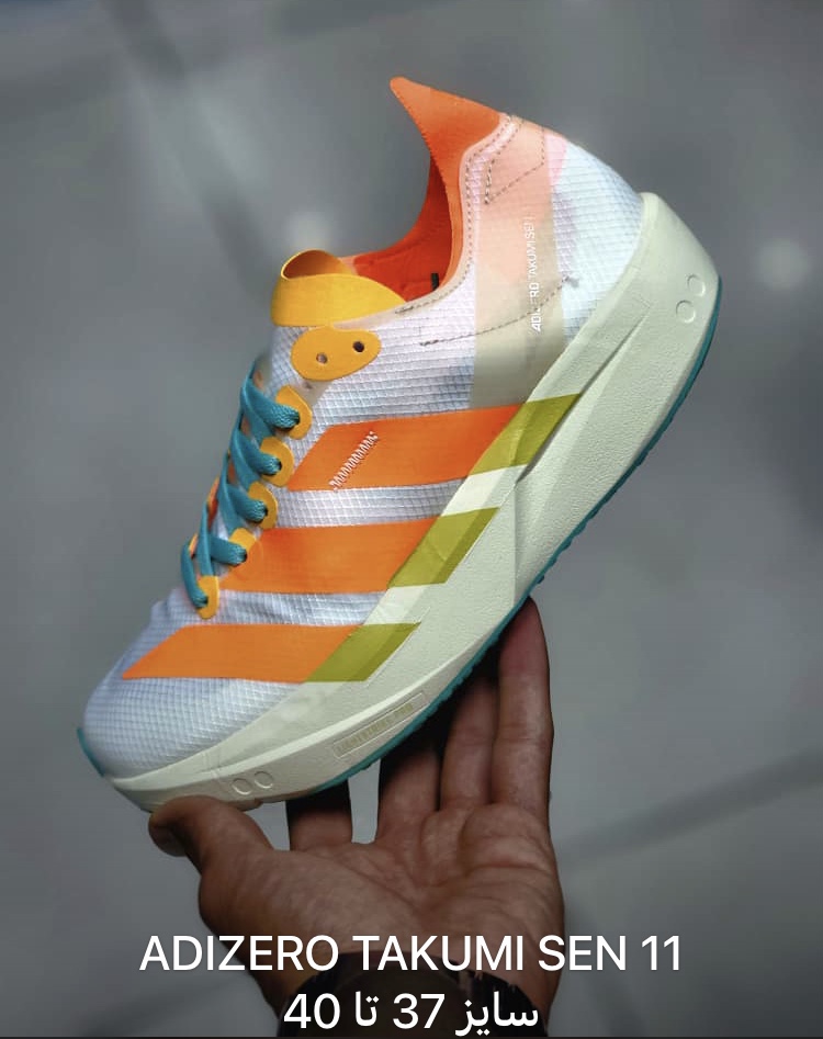 کتونی آدیداس آدیزیرو تاکومی سن 11 سایز 37 تا 40 سفید نارنجی زرد ADIDAS ADIZERO