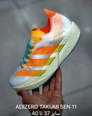 کتونی آدیداس آدیزیرو تاکومی سن 11 سایز 37 تا 40 سفید نارنجی زرد ADIDAS ADIZERO